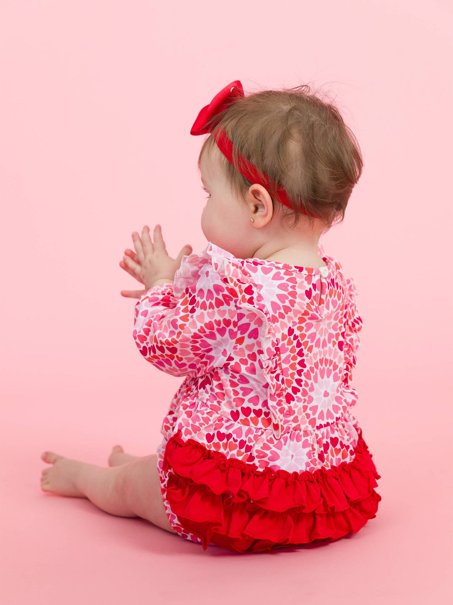 Baby Girls Pink Kaleidoscope Hearts Knit Long Sleeve Waterfall Bubble Romper